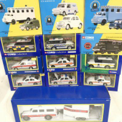 A Collection of Boxed Corgi Police Vehicles.