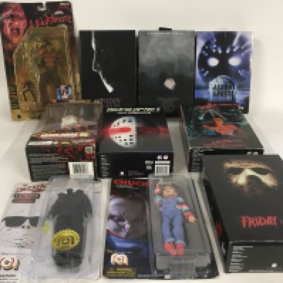 A collection of 10 boxed Horror related action figures.