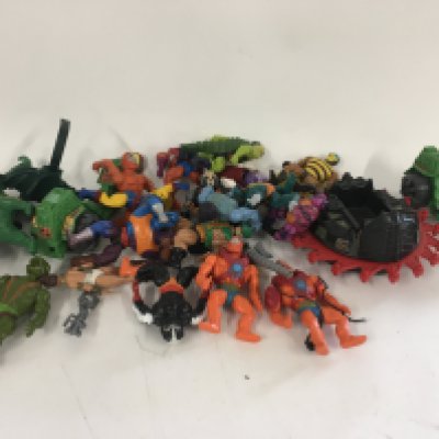 A collection of vintage HeMan Masters of the Universe figures