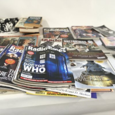 A collection of of Dr.Who books..photos..jigsaw..dvds..and Radio Times magazines with Dr Who articles