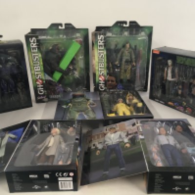 A collection of 7 boxed action figures from the 1980s including Back to the Future ..Ghostbusters and Teenage Mutant Ninja Turtles.