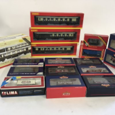 A range of 00 gauge model railway carriages and wagons..manufactured by Hornby..Bachmann..Lima and Dapol.