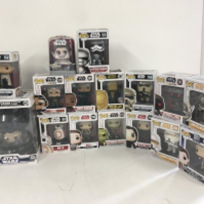 A collection of funko pop Star Wars figures