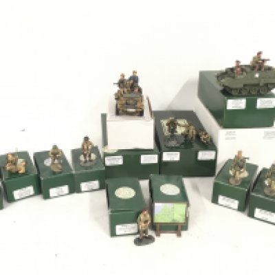 A boxed collection of King and Country model military vehicles and soldiers from England..US and Germany.