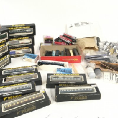 A collection of of n gauge wagons..coaches and accessories by various manufacturers including Graham Farish ..Ultimate Models etc.