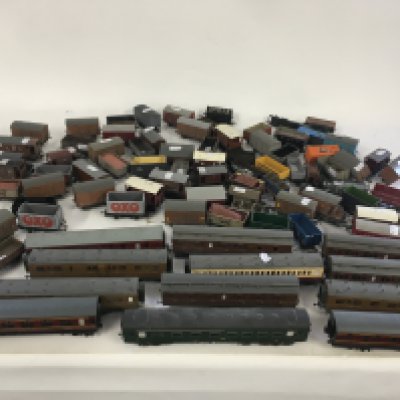 A joblot collection in excess of 80 model railway Wagons and coaches by various manufacturers. 00 gauge