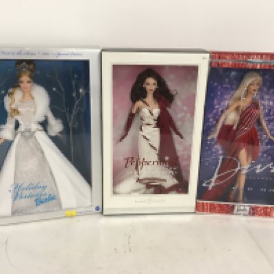 A collection of three Barbie dolls including Winter Fantasy..Peppermint Obsession and Diva collection Red Hot. (3)
