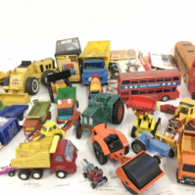 A collection of of Playworn model vehicles both diecast and plastic by various manufacturers. Also includes a number of toy catalogues.