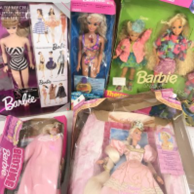 A Collection of Boxed Barbies including a 35Th Anniversary Barbie. Boxes In Various States.