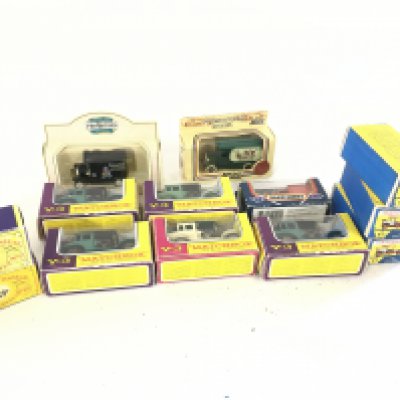 A collection of boxed diecast model vehicles primarily by Matchbox in the Models of Yesterday