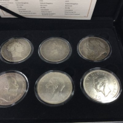 A collection of 6 well presented silver crowns. Postage B