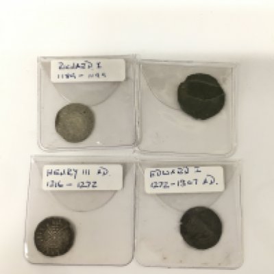 Four early hammered coins including a silver penny.