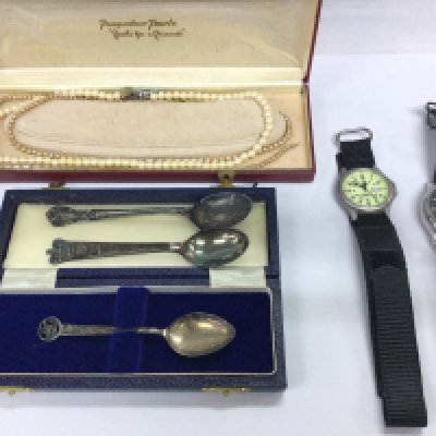 A collective lot including simulated pearls watches and spoons including silver and silver plate.