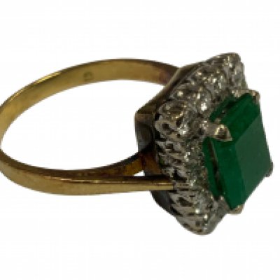 18ct Emerald and Diamond cluster ring.