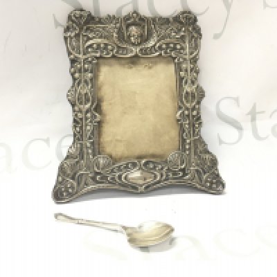 A vintage silver picture frame and a silver hallmarked spoon. Postage B