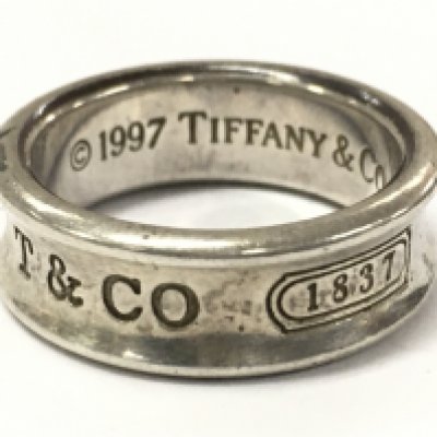 A fully hallmarked silver Tiffany & Co ring size O .postage category A
