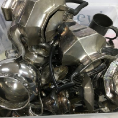 Two boxes of silver plated cutlery and kitchenware.