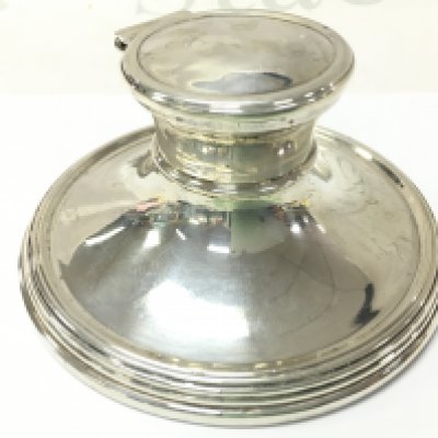 A silver capstan inkwell, 7cm tall. postage catB