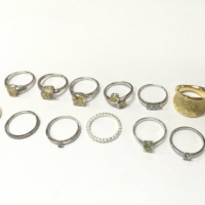 Silver and other dress rings set with various stones including Opal. Postage category A