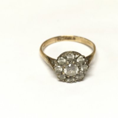A 9ct gold ring set with white stones. 2.44g and P