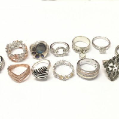 A Collection of silver rings , also including non silver rings. Ring sizes P & O. 56g total lot weight. Postage category A