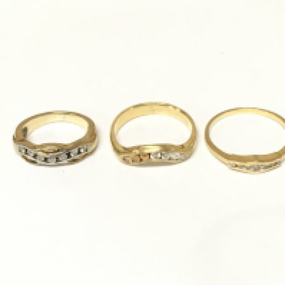 Three unmarked rings set with diamonds. Approximately 9.8g and sizes H P and Q