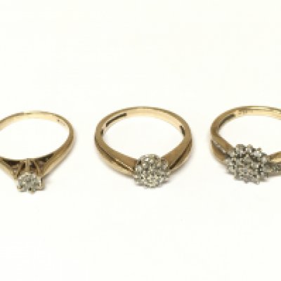 Three 9ct gold diamond cluster rings. Approximately 6.75g sizes K N & N 1/2