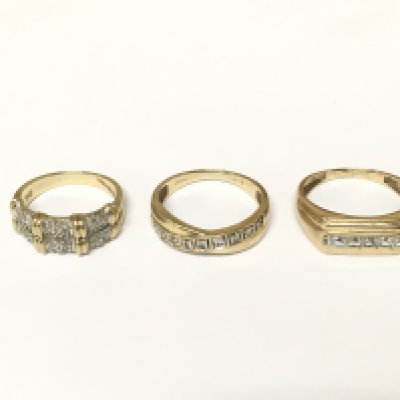 Three 9ct gold diamond band rings. Approximately 8g and sizes L and P