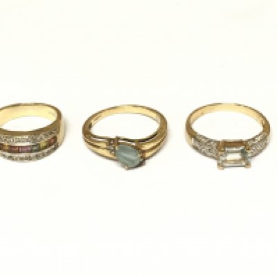 Three 9ct gold cluster rings set with assorted stones. Approximately 8.2g sizes I N and O