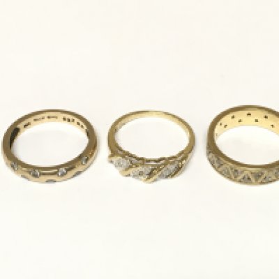 Three 9ct gold diamond rings. Approximately 9.5g and sizes L M and N