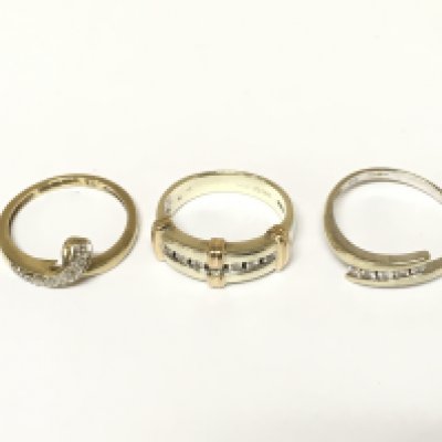 Two 9ct white gold diamond band rings and a 9ct yellow gold band ring. Approximately 8.8g and sizes K 1/2 M and Q