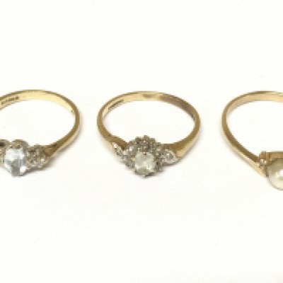 Three 9ct gold rings set with assorted gems and stones. Approximately 4.6g and sizes I 1/2 L 1/2