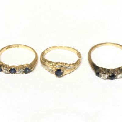 Three 18ct gold diamond and sapphire set rings. Approximately 6.6g and sizes J L and O