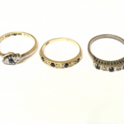 Three 18ct gold diamond and sapphire set rings one is white gold. Approximately 7.7g size O and P