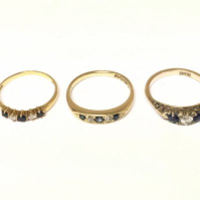 Three 18ct gold diamond and sapphire set rings. Approximately 7.5g sizes M N and O