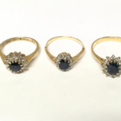 Three 18ct gold diamond and sapphire cluster rings. Approximately 9g and sizes L M and Q