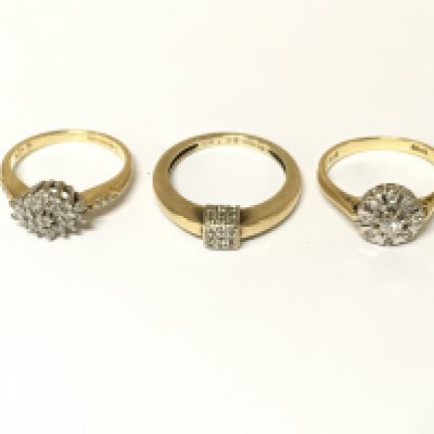 Three 18ct gold diamond cluster rings. Approximately 9.6g sizes J L 1/2
