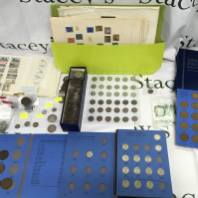 A collection of stamps and coinage including pre 1946 silver examples.