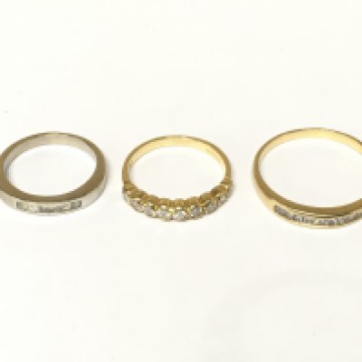 Three 18ct gold half hoop diamond rings. Approximately 6.5g and sizes G 1/2 I and R