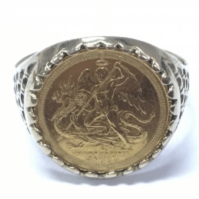 A St Micheal Fine Gold 22ct 1/20 ounce coin mounted in a 9 carat gold ring. 4.2g total weight . Postage category A