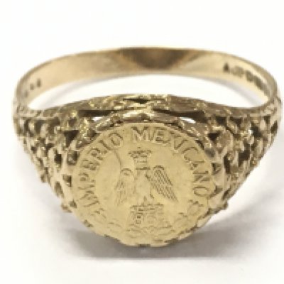 A Imperio Mexicano 1865 coin mounted in a 9 carat gold ring . Size R. Total weight 2.9g Postage cat a