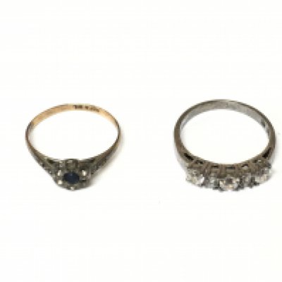 A 9ct gold and silver ring 1.14g and a silver ring both set with CZ. Size N and N 1/2