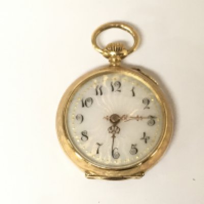 A ladies 18ct gold fob watch with enamel back. Winds and runs but not tested for time keeping. 16.31g