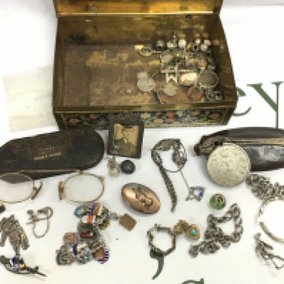 A tin of mixed silver odds, brooches , coins etc . Postage category B