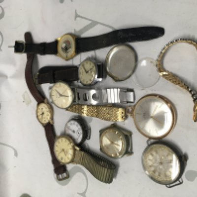 A Collection of vital wrist watches including silver case .