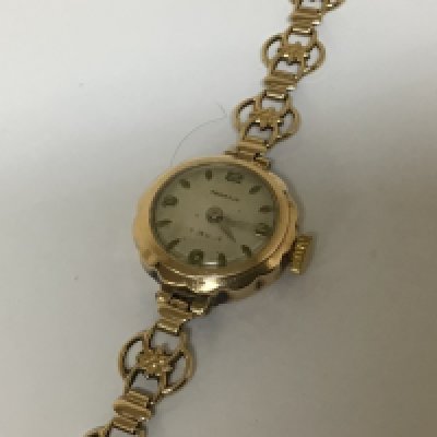 A Vintage 9carat gold ladies watch maker Pegasus with an attached 9carat gold open link bracelet. Weight 12g