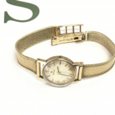 A vintage 9ct gold omega ladies watch. Not running. Total weight 18.47g