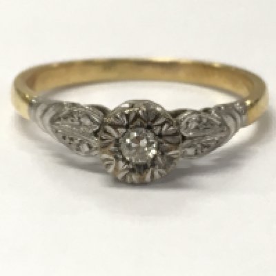 An 18ct and platinum diamond ring , 2.6g total weight. postage category A