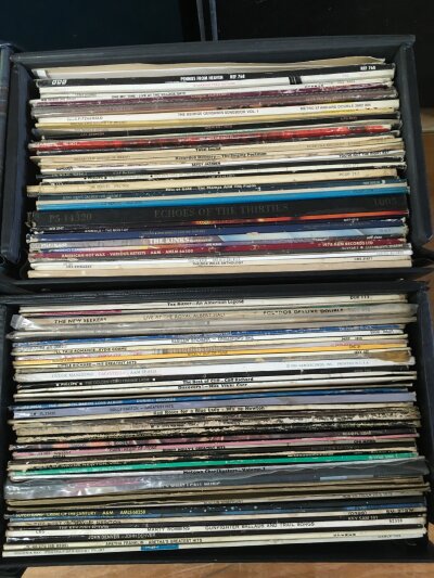 Eight record cases of LPs by various artists including The Beatles, The Rolling Stones, T Rex and many more.