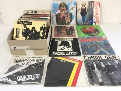 A collection of punk 7" singles by various artists including Sex Pistols, The Jam, Chron Gen, UK Subs and others.